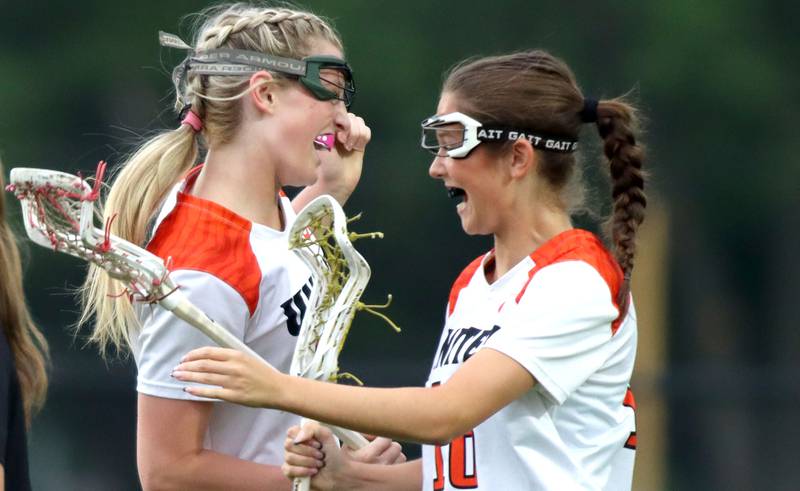 Crystal Lake Central United’s Ella Trudeau, left, and Sydney Cruz celebrate a Trudeau goal against Huntley’s in IHSA Sectional Title Game action at Crystal Lake Central High School in Crystal Lake on Friday, May 30, 2025.