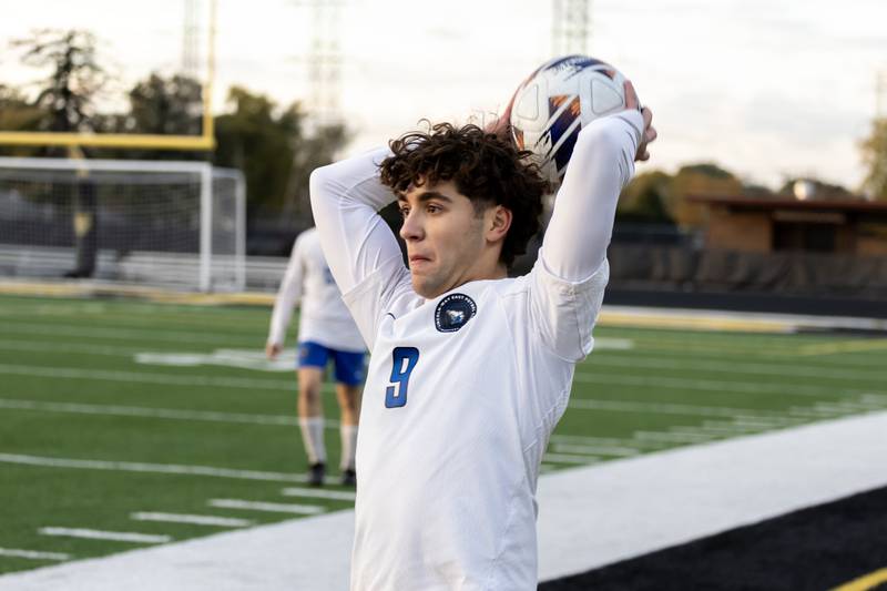 Lincoln-Way East's Charles Lungaro throws-in during the 3A Joliet West Sectional boys varsity soccer match against Lincoln-Way Central at Joliet West on Oct. 29, 2025.