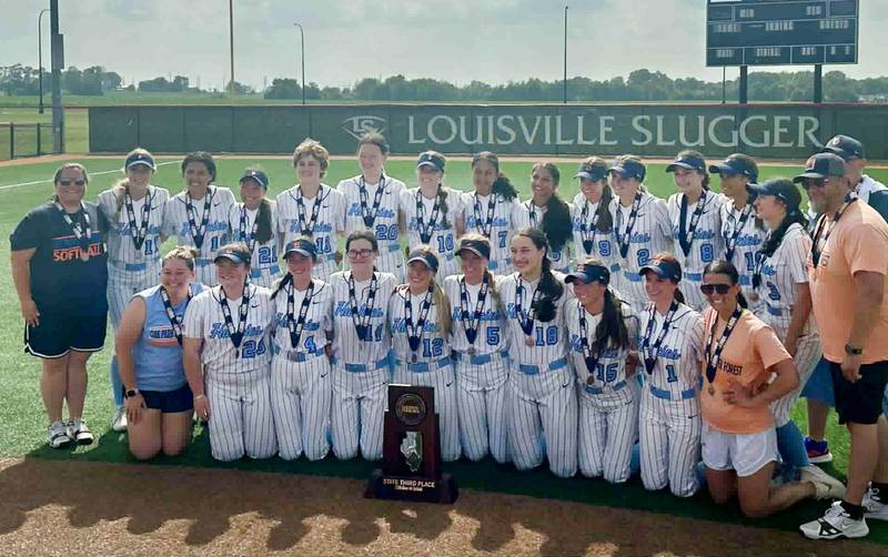 Members of the Oak Park River Forest softball team pose with the Class 4A third-place trophy on Saturday, June 14, 2025 at the Louisvile Slugger Complex in Peoria.