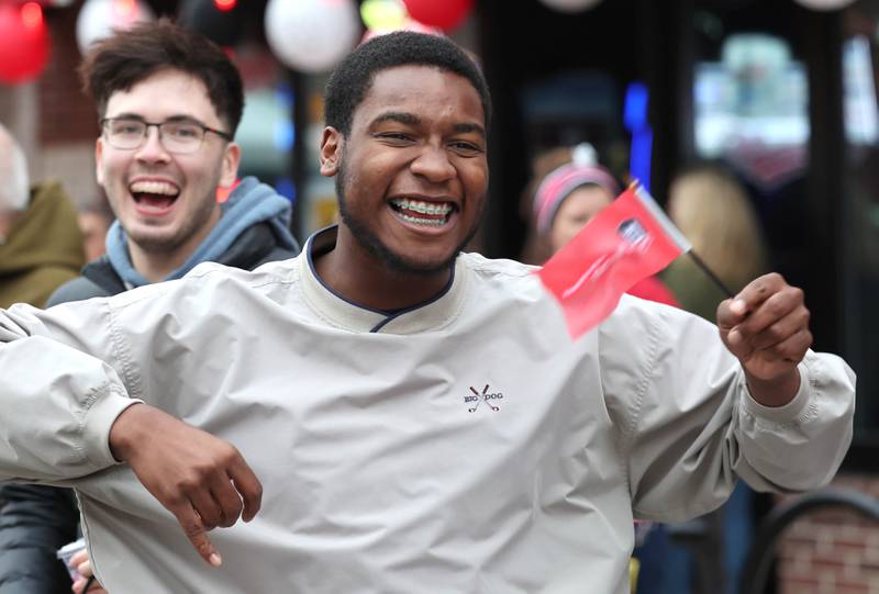 Amir Bolden, a sophomore at Northern Illinois University from Rockford, has some fun with his friends during the NIU Huskie Homecoming Block Party Thursday, Oct. 12, 2023, in downtown DeKalb.