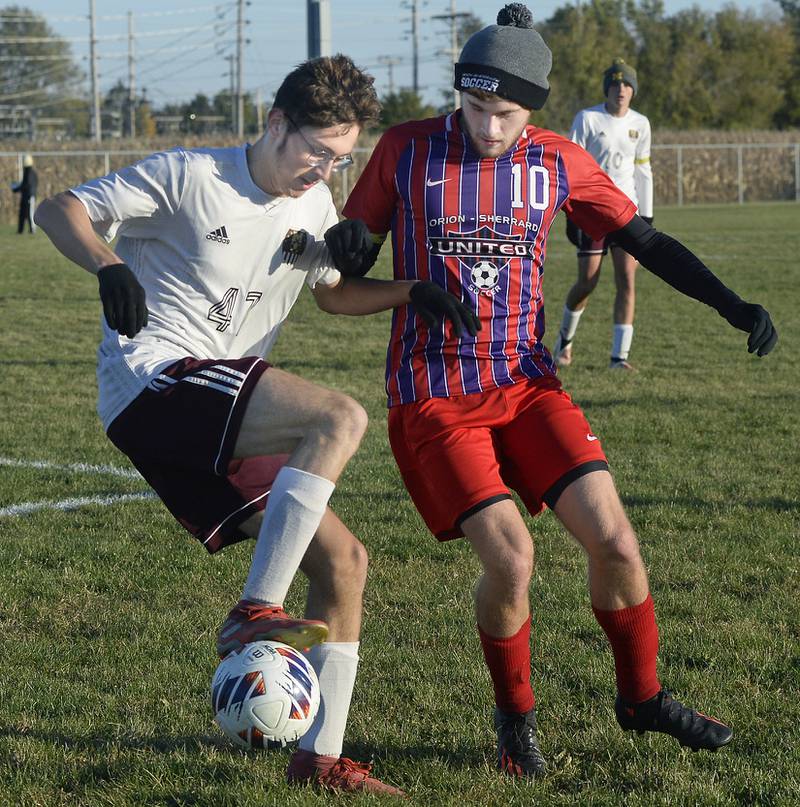 Morris’ Leiv Escatel and Orion’s Cole Kimball fight for control of the ball in the Class 2A boys soccer Regional on Tuesday, Oct. 18, 2022 at the La Salle-Peru Athletic Complex in La Salle.