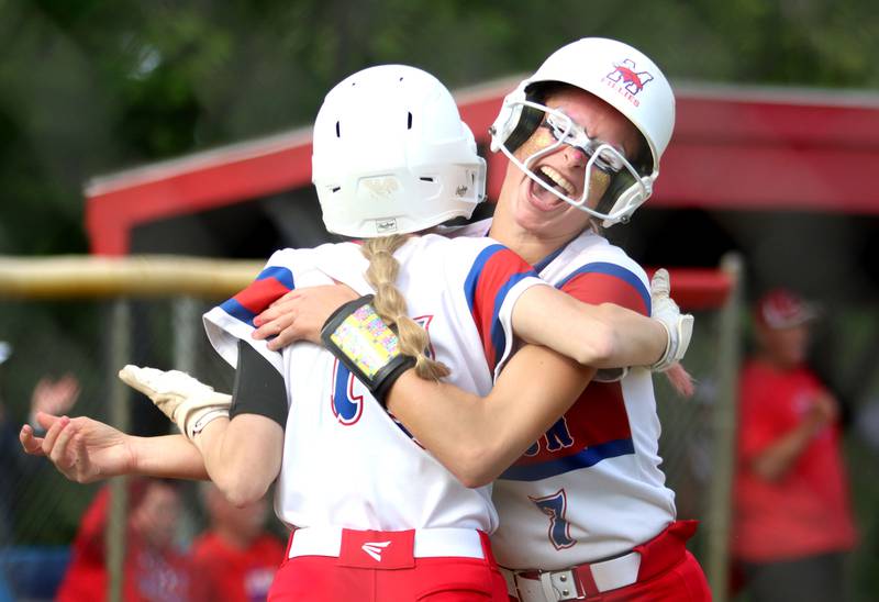 Morrison’s Bella Duncan embraces teammate Claire DeRycke as the Fillies rally against Marengo in IHSA Class 2A Sectional Semifinal softball action at Marian Central High School in Woodstock on Thursday, May 29, 2025.