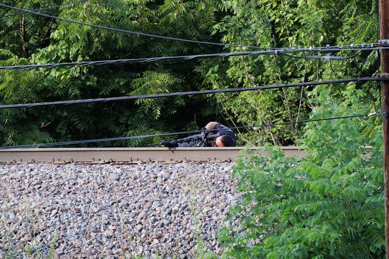 A Woodstock man was charged with illegally possessing three firearms after police and a SWAT team surrounded a home for five hours Wednesday Aug. 2, 2023.