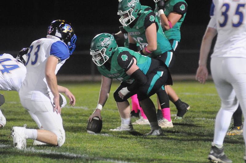 Seneca center Kellen Arnold sets himself up to snap against Dupec on Friday, Oct. 24, 2024.