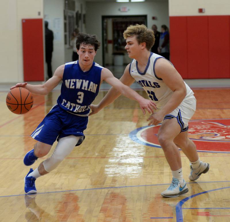 Sterling Newman's Garret Matznick (3) drives the lane as Hinckley-Big Rock's Austin Albus (11) defends during Friday, Nov. 24, 2023 action at the Oregon Thanksgiving Tournament at the Blackhawk Center at Oregon High School.