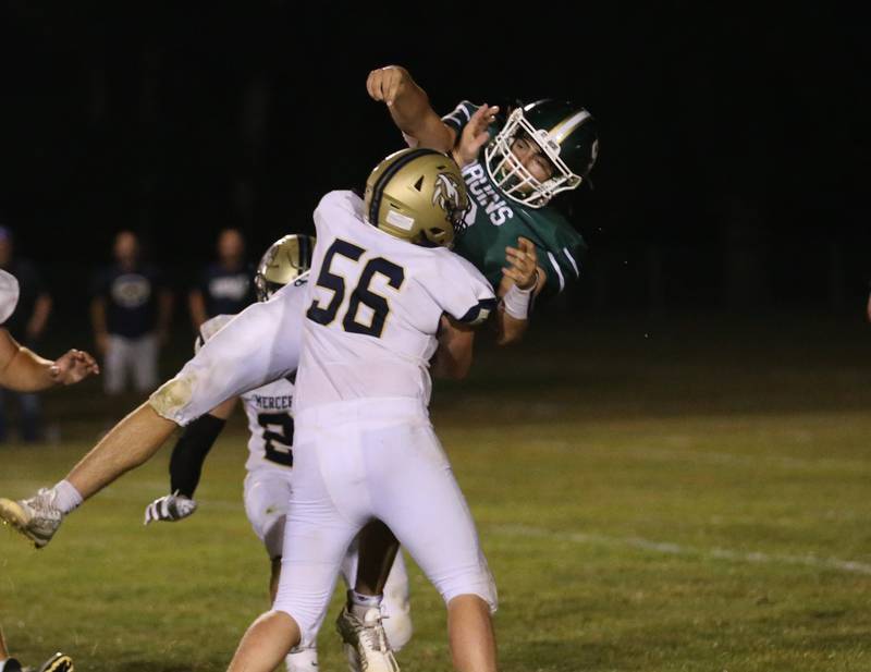 Mercer County's Brodie Salmon hits St. Bede's quarterback Max Bray as he throws a pass on Friday, Sept. 1, 2023 at St. Bede Academy.