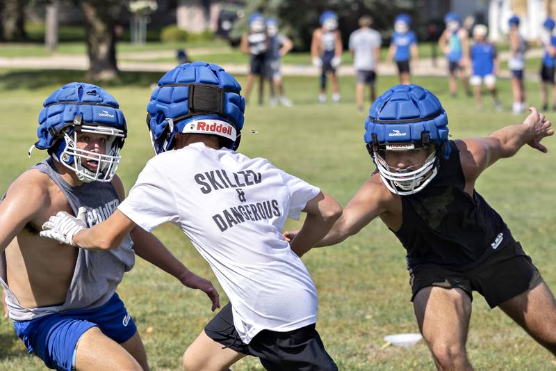 Newman players practice special team drills Tuesday, August 12, 2025, at the high school. The team is gearing up for the 2025 season.