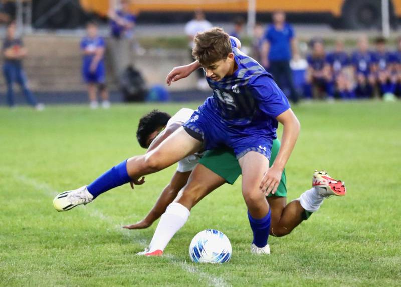 Princeton's Asa Gartin battles to regain control against Alleman Thursday night at Bryant Field. The visiting Pioneers won 8-0.