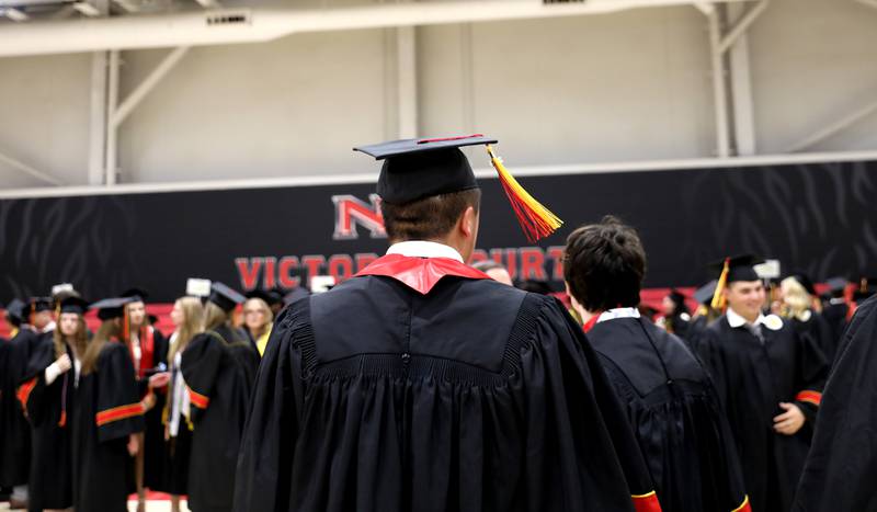 Batavia High School graduates enter the staging area before the school’s 2025 commencement ceremony on Wednesday, May 21, 2025 at Northern Illinois University in DeKalb.