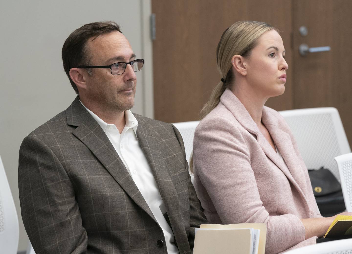 Cary residents and witnesses Chris Dombkowski and Crystal Noe attend an adjudication court hearing on Friday, September 1, 2023 at the Cary Municipal Center regarding fireworks being used in their neighborhood. Ryan Rayburn for Shaw Local