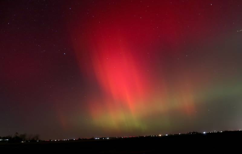 The Aurora Borealis (Northern Lights) dazzles over the night sky just south of Mendota along Route 251  on Tuesday, Nov. 11, 2025. Two coronal mass ejections (CMEs) created sparking geomagnetic storm conditions, according to the National Oceanic and Atmospheric Administration (NOAA). Space weather forecasters anticipate that geomagnetic activity may intensify to strong (G3) conditions overnight and could be around again tomorrow night.