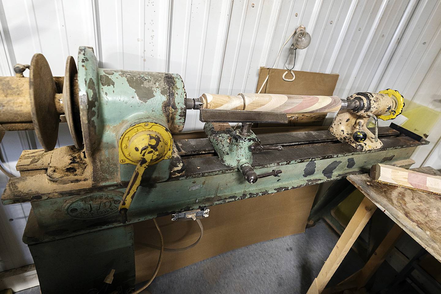 The shop is filled with old, reliable equipment. No computers or electronics is any of the gear.