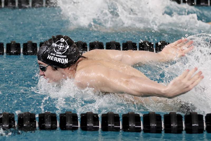 Cary-Grove’s Victor Praczkowski swims the butterfly as he competes in the 200 medley relay during the  Fox Valley Conference Invitational swim meet on Saturday,  Feb. 15, 2025, at Woodstock North High School.