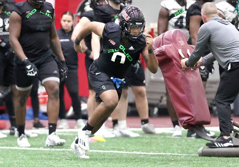 Northern Illinois linebacker Tyler Jackson runs through a drill during the teams first spring practice Wednesday, March 22, 2023, in the Chessick Practice Center at Northern Illinois University in DeKalb.