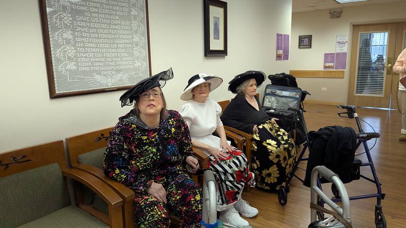 Joshua Arms Senior Residences models Jayne Schaeflein, Betty Darby and Vallerie Horschler patiently wait their turn to be photographed during their pre-fashion and talent show photo shoot on Friday, April 18, 2025, at Joshua Arms Senior Residences in Joliet.