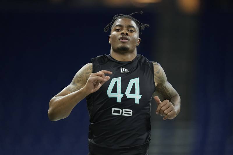 Penn State defensive back Jaquan Brisker runs the 40-yard dash at the NFL Scouting Combine on March 6, 2022, in Indianapolis.