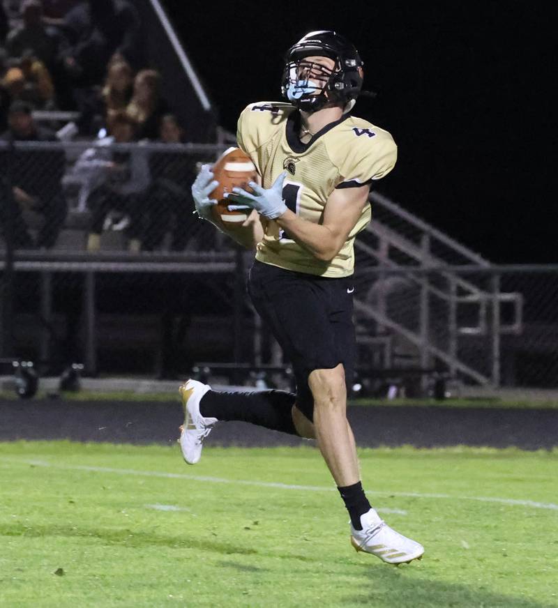 Sycamore's Aidan Wyzard gets behind the Ottawa secondary for a touchdown reception during their game Friday, Sept. 27, 2024, at Sycamore High School.