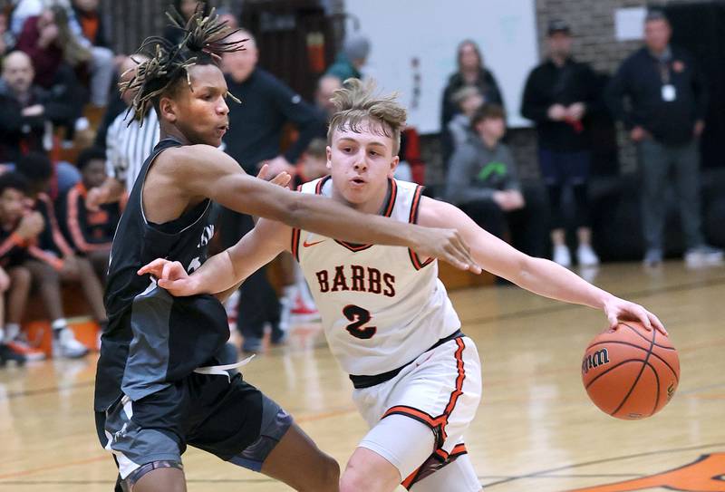 DeKalb’s Sean Reynolds tries to get by Kaneland's Isaiah Gipson during their game Monday, Feb. 12, 2024, at Huntley Middle School in DeKalb.
