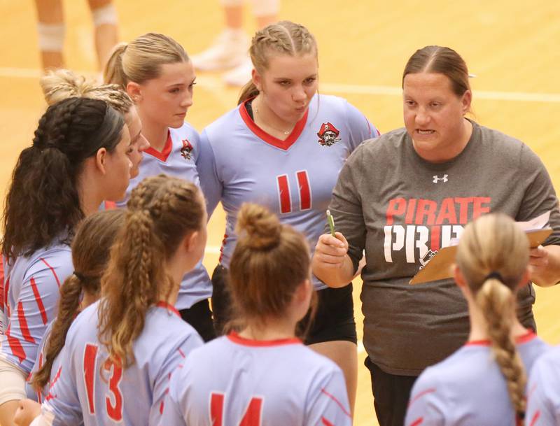 Ottawa head volleyball coach Jenn Crum coaches her team against L-P on Thursday, Sept. 21, 2023 at Kingman Gym.