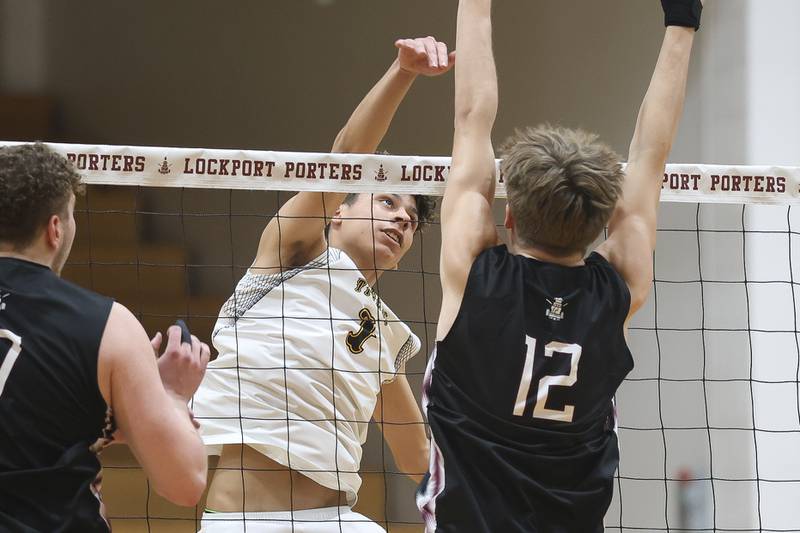 Joliet West’s Adrian Benavides eyes a shot against Lockport on Tuesday, March 31, 2026 in Joliet.