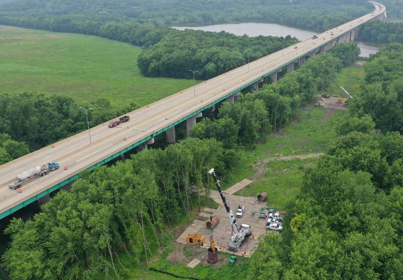 An aerial view of crews working on the Abraham Lincoln Memorial Bridge crossing the Illinois River near La Salle.  Work will maintain the bridge expansion joints. The project will begin in the southbound lanes and one lane of traffic will be open. Work will later shift to the northbound lanes. The $1.3 million project is expected to be completed by the end of July.