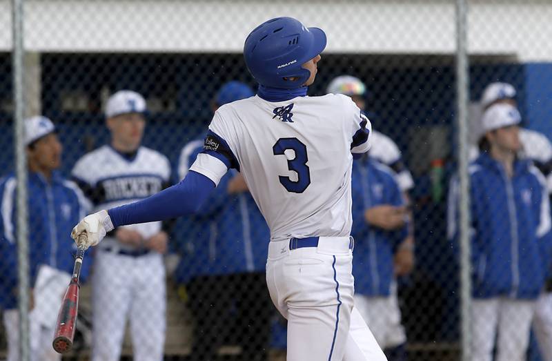 Burlington Central's Andrew Payton watches his grand slam homer during a Fox Valley Conference baseball game on Friday, April 12, 2024, at Burlington Central High School.
