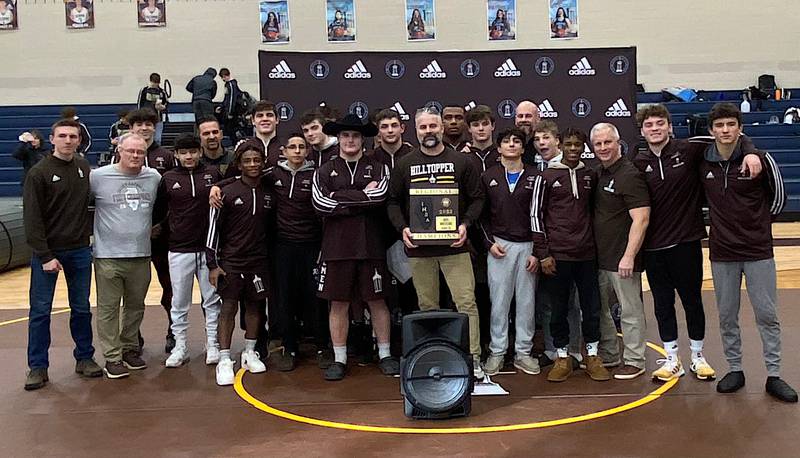 The Joliet Catholic Academy wrestling team won the championship at its own Class 2A regional, and advanced all 14 wrestlers to next week's sectional.