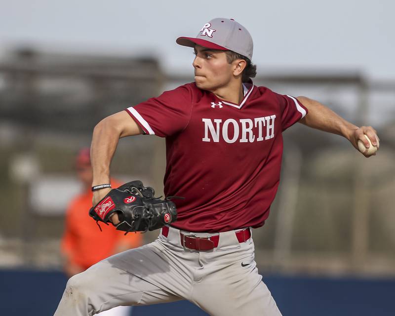Plainfield North's Max Barriball (8) delivers a pitch during baseball game between Plainfield North at Oswego, Thursday, April 24, 2025 in Oswego.
