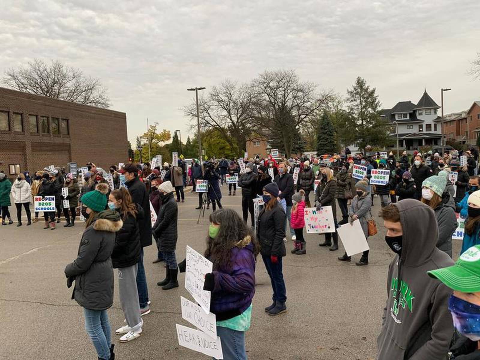 'This is simply about our kids' Elmhurst District 205 parents rally for