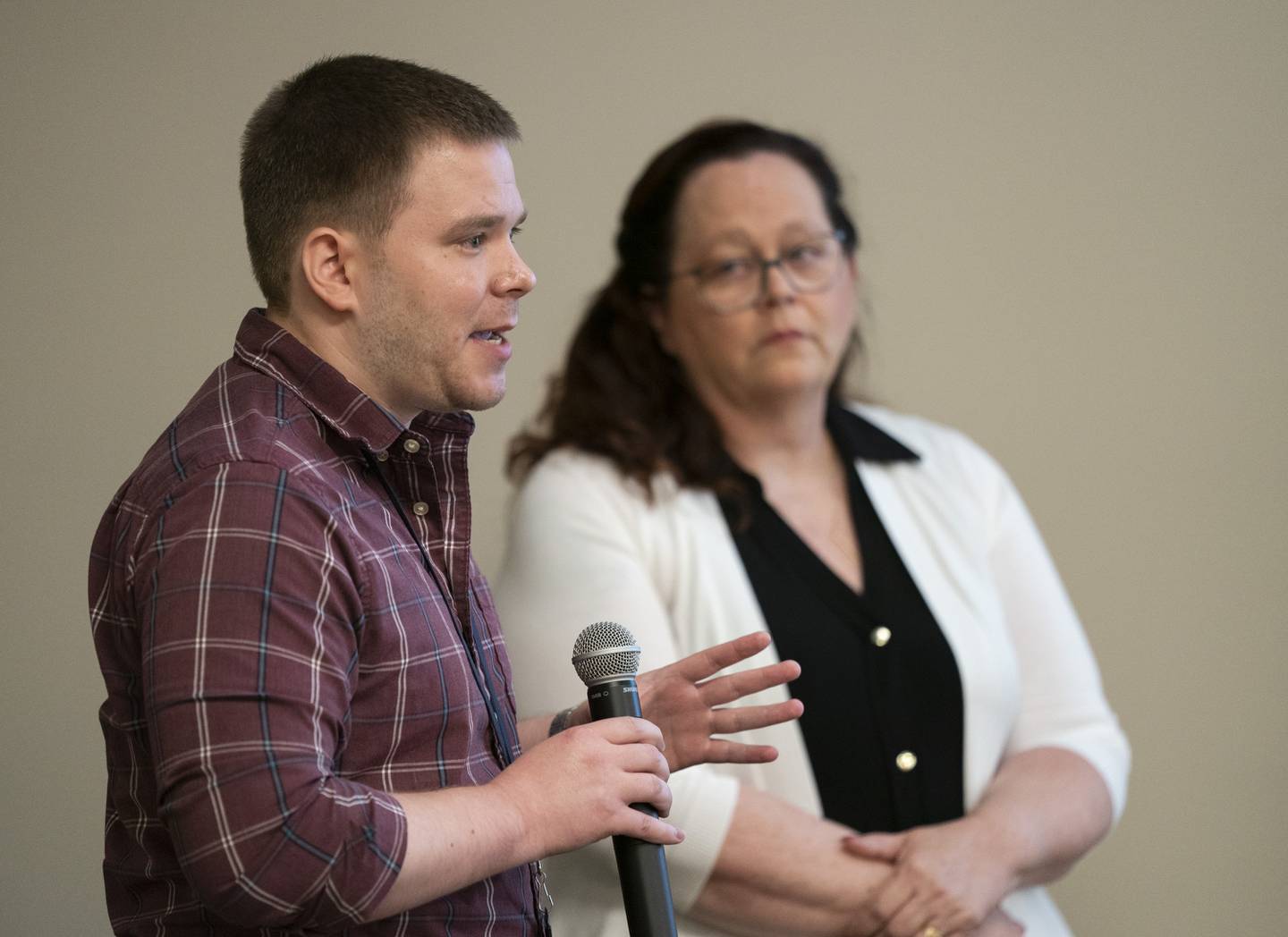 Ryan Sachs, epidemiology program coordinator for the McHenry County Department of Health and Laura Crain, program coordinator for the McHenry County Substance Abuse Coalition deliver a presentation on fentanyl overdoses in McHenry County on Tuesday, July 26, 2022 to the McHenry County Mental Health Board in Crystal Lake.