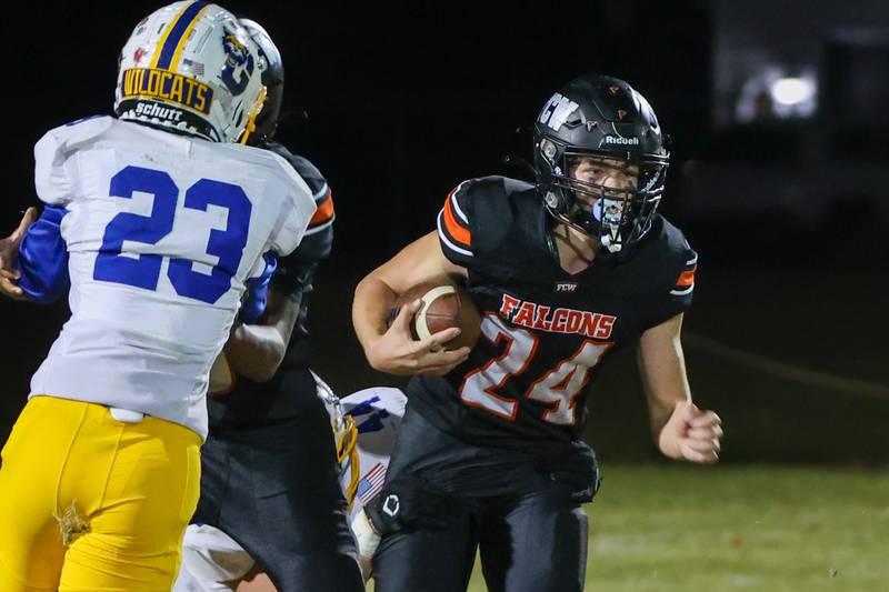 Jaxon Flahaut of Flanagan Cornell Woodland runs with ball on Friday, October 25, 2024 at Flanagan High School in Flanagan.
