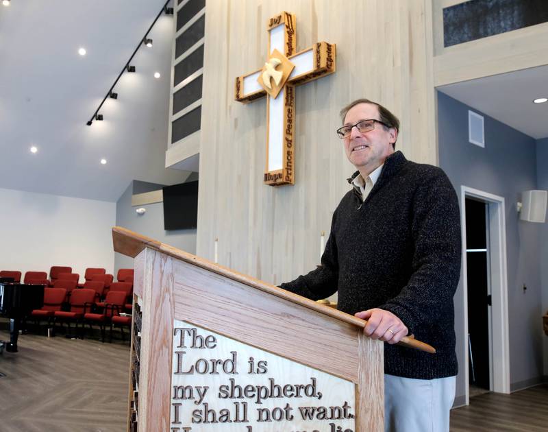 Jonathan Crail, senior pastor at the First United Methodist Church of DeKalb, Friday, Jan. 24, 2025, at the pulpit in the church.