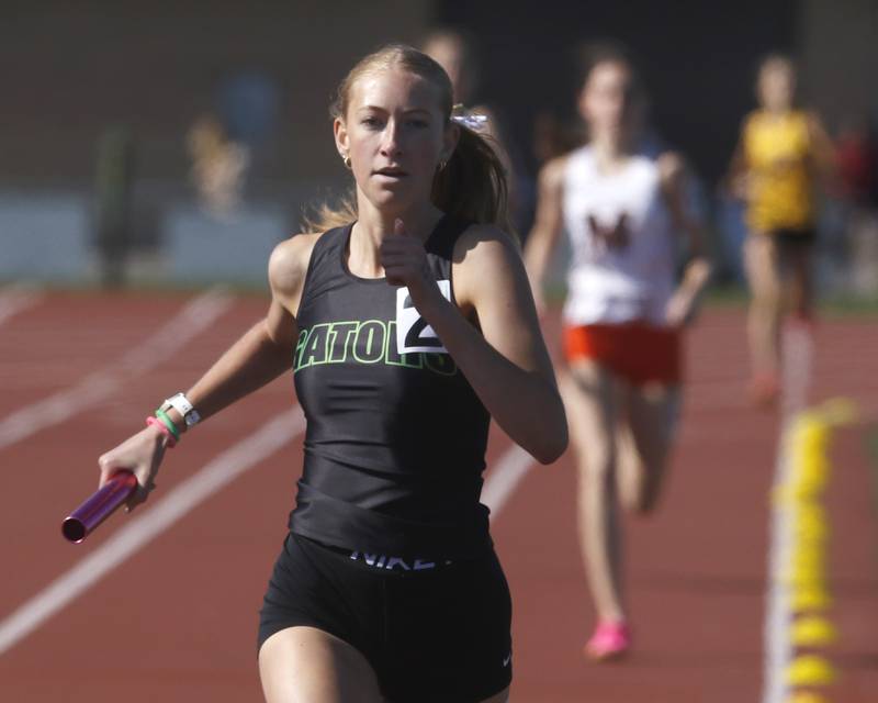 Crystal Lake South’s Laynie Ripley, runs to the finish line as she win the 4x800 meter relay with her teammates on Thursday, May 8, 2025, during the Fox Valley Conference Girls Track and Field Meet at Huntley High School.