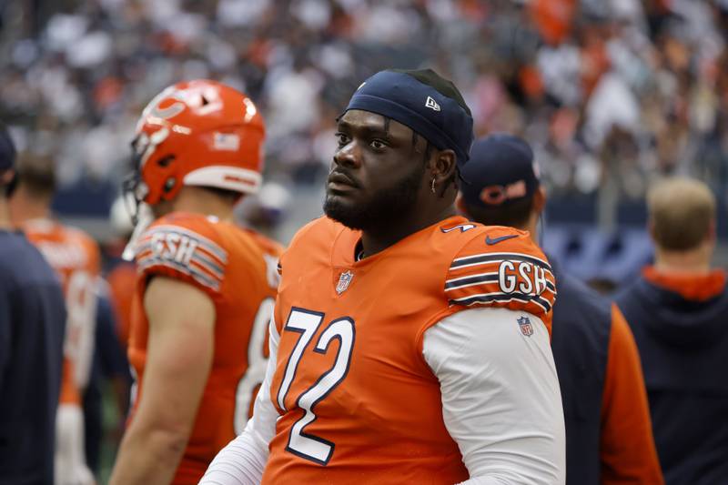 Chicago Bears offensive tackle Alex Leatherwood walks on the sideline during a game against the Dallas Cowboys in Arlington, Texas, Saturday, Oct. 30, 2022.