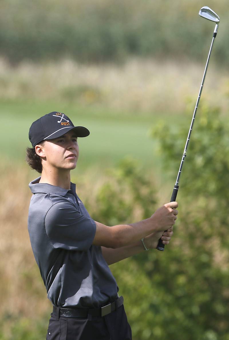 Crystal Lake Central’s Asher Johnson watches his tee shot on the eighth green during the IHSA Class 2A Crystal Lake South Boys Golf Regional on Wednesday, Oct. 1, 2025 at RedTail Golf Club in Lakewood.
