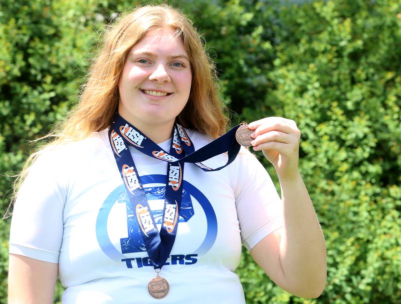 Princeton's Morgan Foes poses for a photo with her medal on Wednesday, May 29, 2024 at Princeton High School. Foes is the Bureau County Republican girls track athlete of the year.