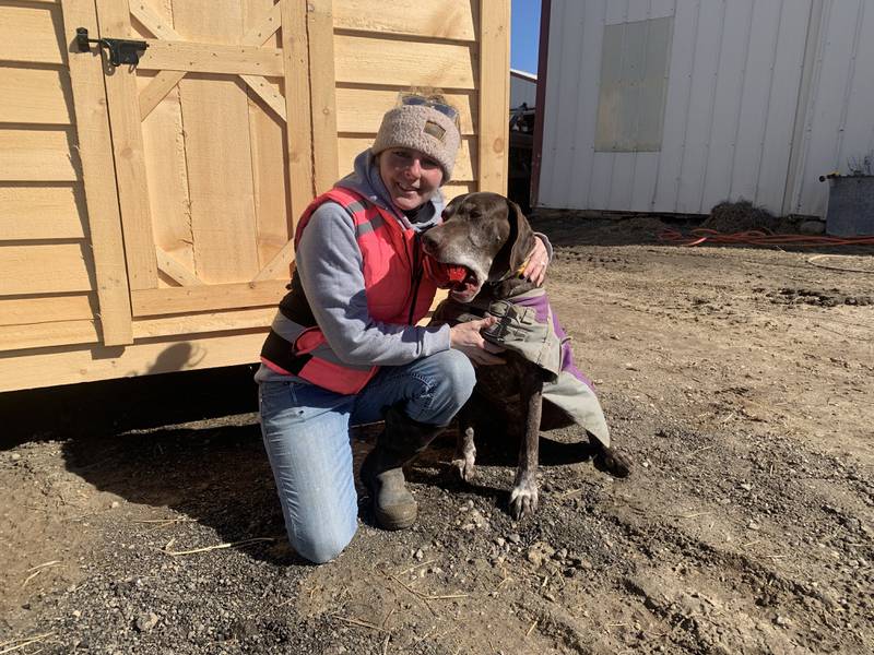 Jennifer Finkelman, founder of Glory Bound Rescue Ranch in Marengo, with Hank, a German shepherd shorthaired pointer whose dad died from COVID.