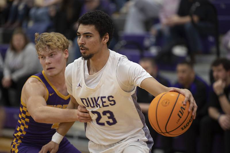 Dixon’s Zander Wilson handles the ball against Sherrard Friday, Feb. 20, 2026.