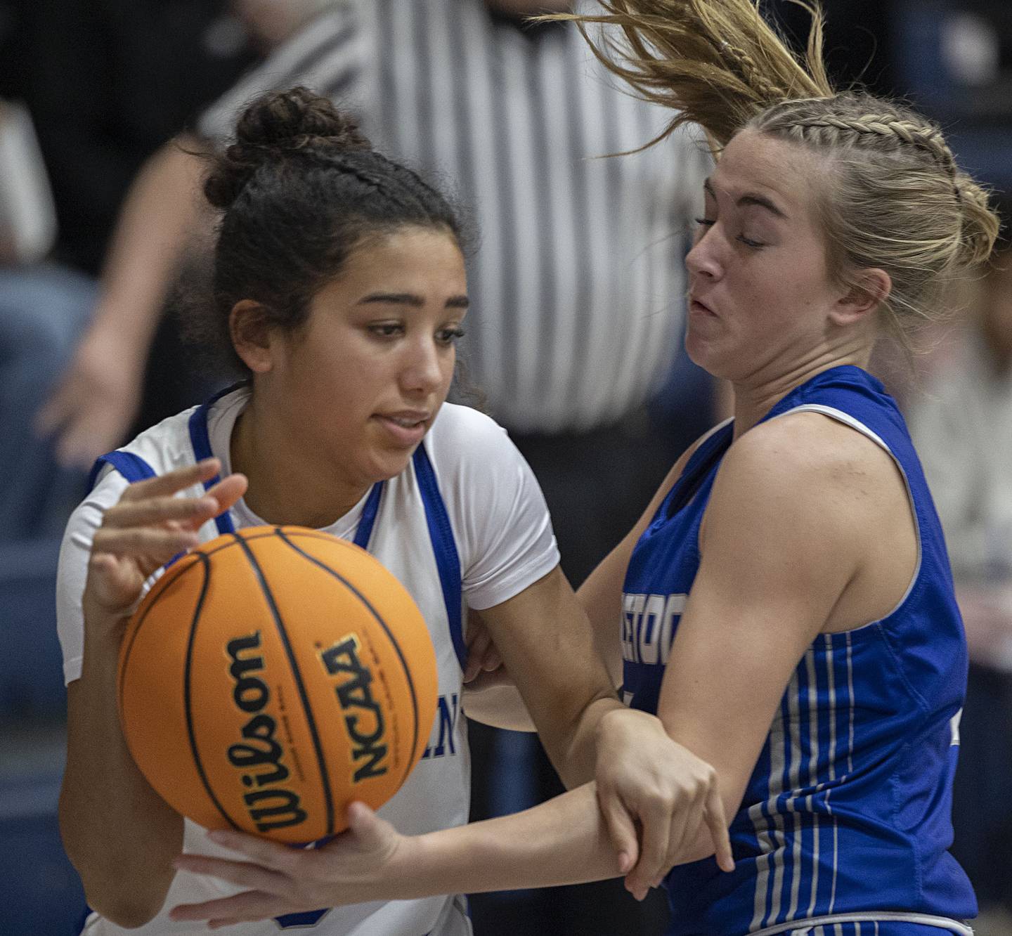 Newman’s Paizlee Williams works against Princeton’s Kiyrra Morris Thursday, Jan. 15, 2026.