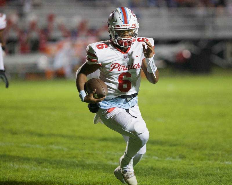 Ottawa's Colby Mortenson runs the ball for a gain against Kaneland on Friday, Sept. 22, 2023 in Maple Park.