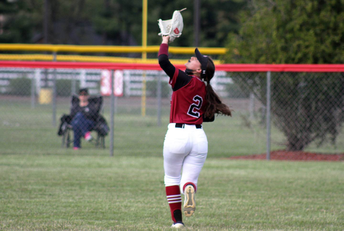 Plainfield North's Victoria Countryman grabs the ball out of the air for an out during the varsity softball game against Yorkville High School, May 13.