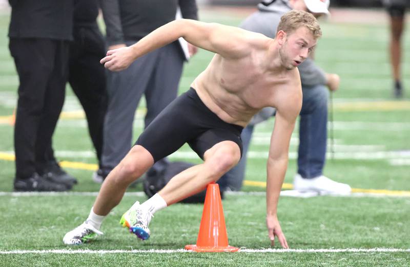 Former Northern Illinois University receiver Cole Tucker, from DeKalb, takes part in a drill Thursday, March 23, 2023, during pro day in the Chessick Practice Center at NIU. Several NFL teams had scouts on hand to evaluate players ahead of the upcoming draft.