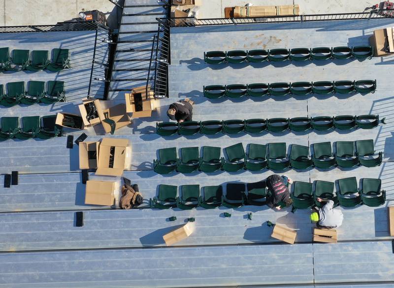 Workers from Hayden Construction installed box seats at Schweickert Stadium on Monday, March 6, 2023 in Peru. The stadium home of the Pistol Shrimp grandstand was approved by the Peru City Council last June. This phase included 575 box seats, a new grandstand and press box.