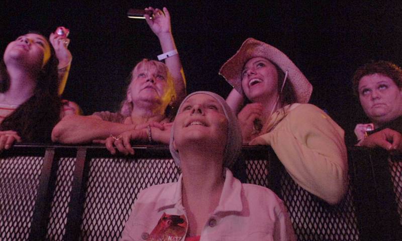 Fans sing along to Trace Adkins as he performed at the Concerts for a Cause series on Saturday, June 25, 2011 at the Illinois Valley Regional Airport in Peru.