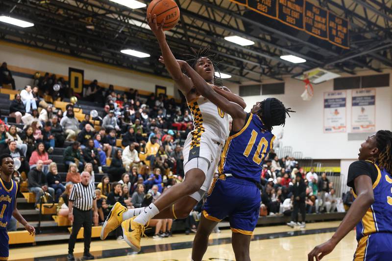Joliet West’s Aamir Shannon goes in for the layup against Joliet Central on Tuesday, Feb. 17, 2026 in Joliet.