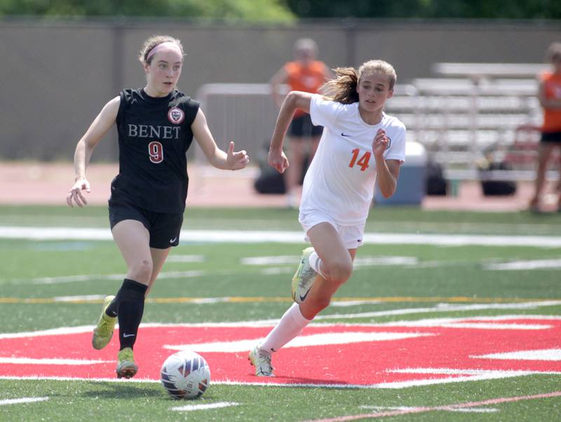 Benet’s Keira Petrucelli (left) and Crystal Lake Central’s Hadley Ferrero go after the ball during a Class 2A girls state soccer semifinal at North Central College in Naperville on Friday, June 2, 2023.