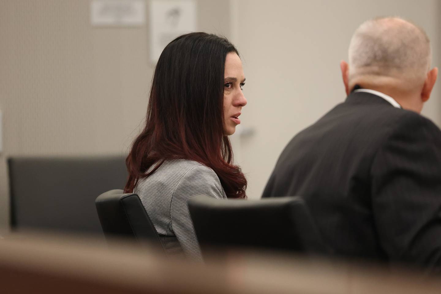 Erin Zilka speaks with her attorney, Jeff Tomzacak, during her trial at the Will County Courthouse on June 27th, 2023 in Joliet. The former Joliet police officer Erin Zilka is on trial on aggravated DUI charges following a deadly 2020 crash where her passenger, Berwyn police officer Charles Schauer, 33, of Glen Ellyn, was killed.
