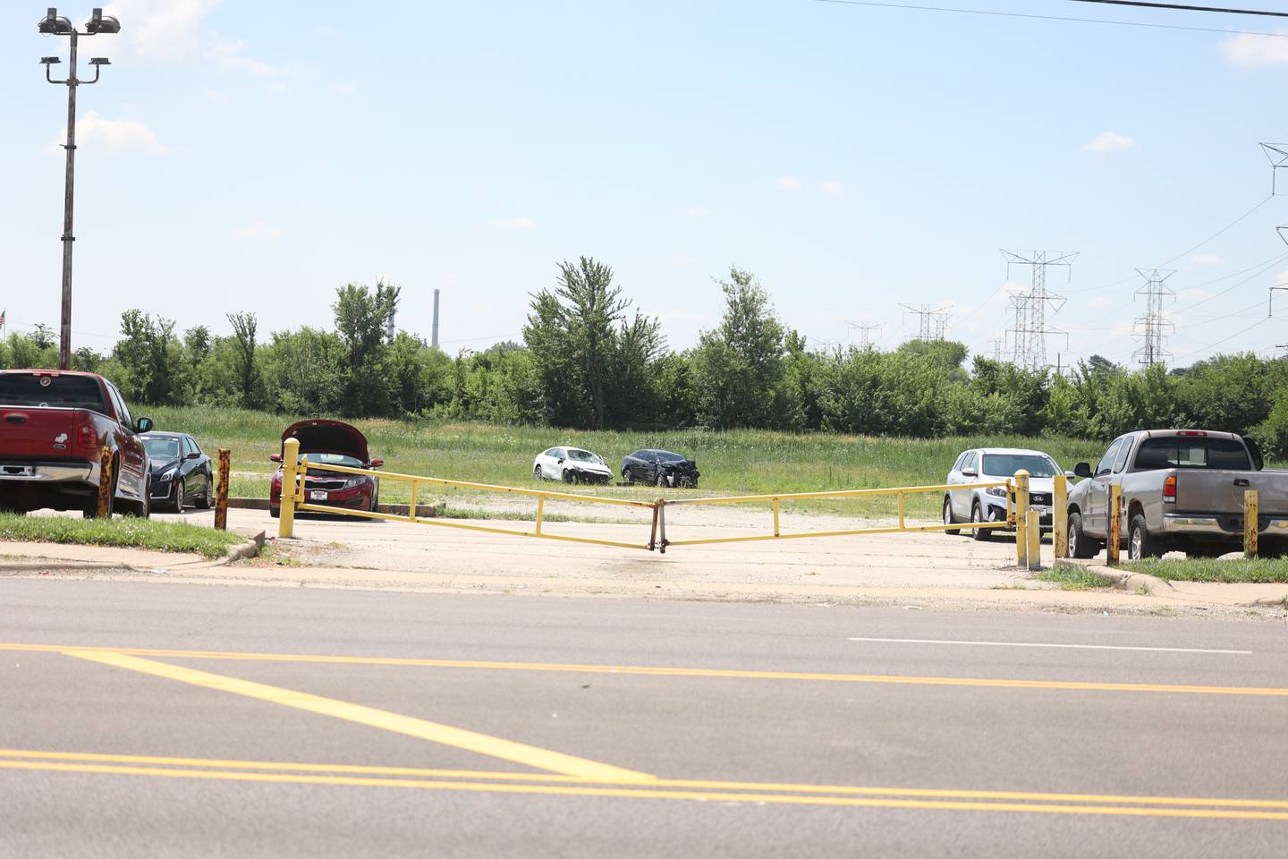 Vehicles from an old Ford dealership sit at the site for a new Duly Health and Care medical facility along West Jefferson in Joliet. Monday, July 18, 2022 in Joliet.