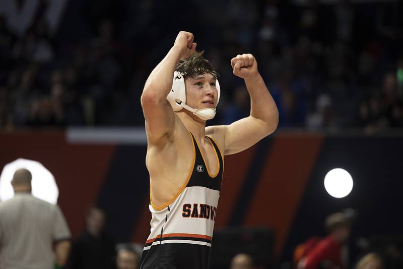Cooper Corder of Sandwich celebrates winning the 1A 150 pound title Saturday, Feb. 21, 2026, at the IHSA wrestling finals in Champaign.