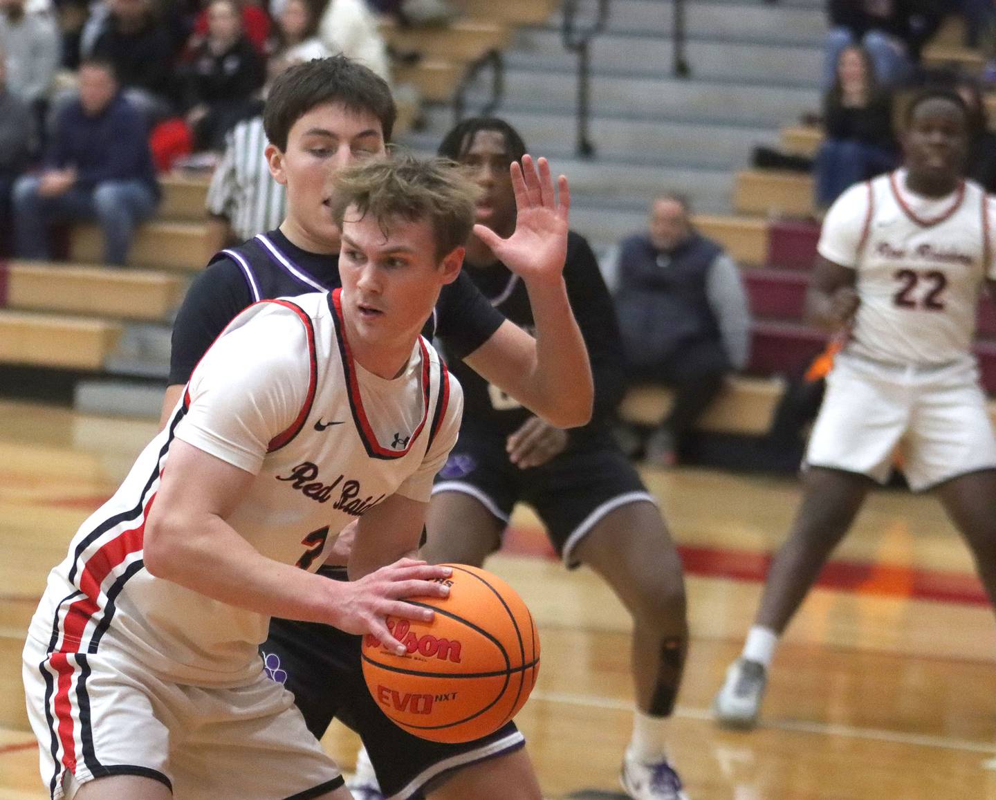 Huntley’s Aidan Gibbs looks for an option against Hampshire in varsity boys basketball on Friday, Dec. 19, 2025, at Huntley High School in Huntley.